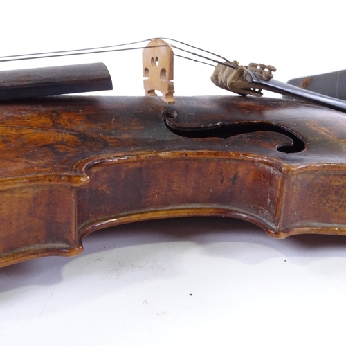 337 - An 18th century violin, indistinct label with date 1703/09?, back length 35cm, with bow and case