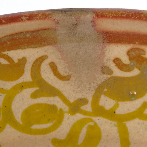 540 - A Spanish lustre glaze pottery bowl, with painted bird decoration, diameter 33cm, and another painte... 