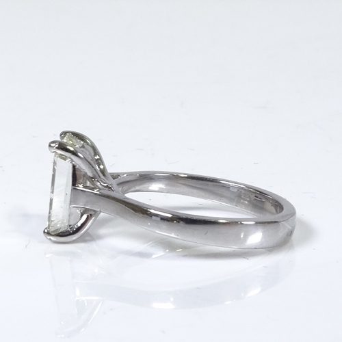 1109 - A 3ct emerald-cut solitaire diamond ring, set in a plain 4-claw platinum setting, clarity approx VS1... 