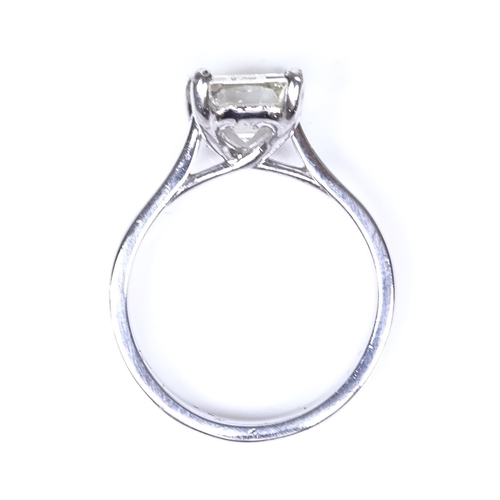 1109 - A 3ct emerald-cut solitaire diamond ring, set in a plain 4-claw platinum setting, clarity approx VS1... 