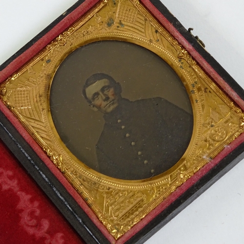 574 - A 19th century American Civil War tin-type photograph, portrait of a soldier in an embossed Stars an... 