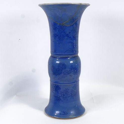 576 - A Chinese blue glazed beaker vase with cherry blossom and bird decoration, 6 character marks to base... 