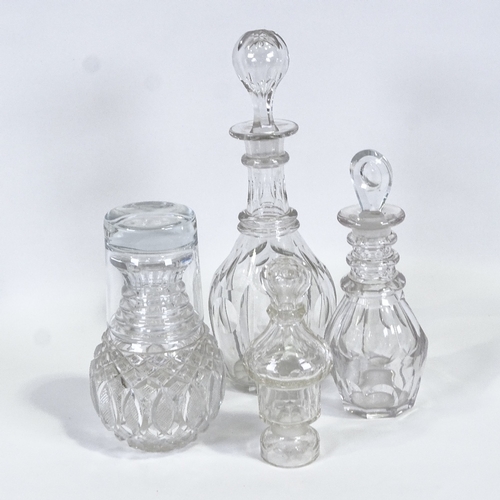 577 - Two Victorian decanters, a water / whisky carafe and pepper, tallest 28cm. (4)