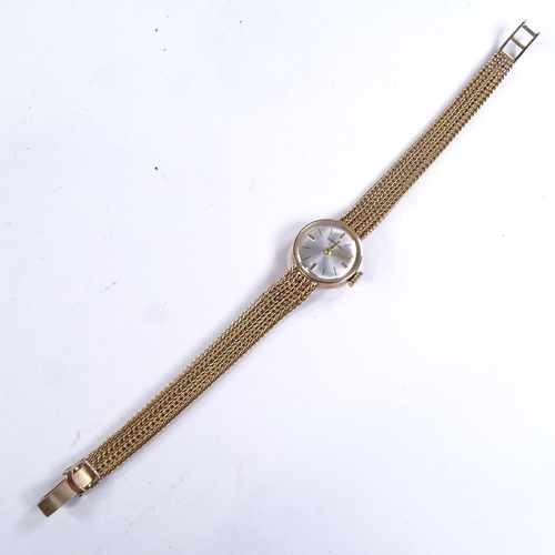 1006 - GARRARD - a lady's Vintage 9ct gold mechanical wristwatch, silvered dial with quarterly gilt baton h... 