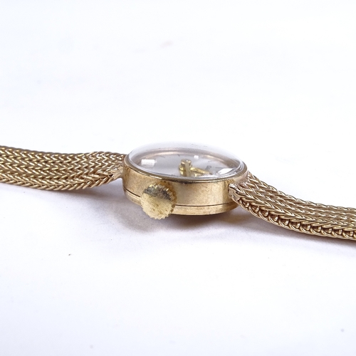 1006 - GARRARD - a lady's Vintage 9ct gold mechanical wristwatch, silvered dial with quarterly gilt baton h... 