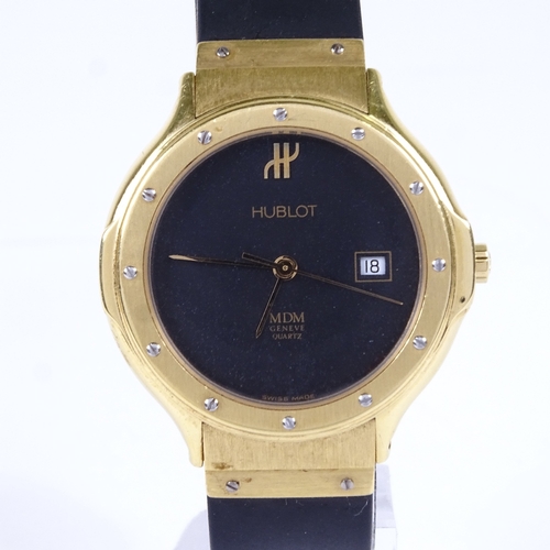 1044 - HUBLOT - a mid-size 18ct gold Classic MDM Geneve quartz wristwatch, ref. 140.10.3, black dial with d... 