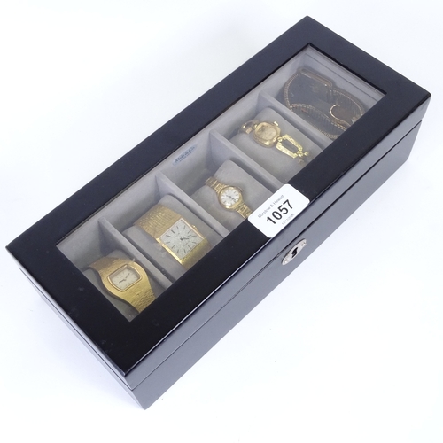 1057 - A modern Mele & Co 5-section watch storage box, containing 7 watches which include Tissot, Avia and ... 