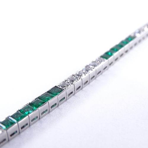 1113 - An emerald and diamond tennis line bracelet, set at alternates with calibre-cut emeralds and round b... 