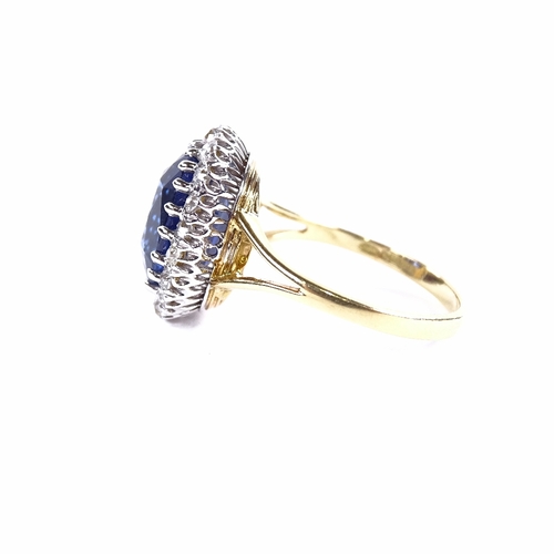 1123 - An oval sapphire and diamond cluster ring, circa 1915, central oval mixed-cut sapphire approx 5.66ct... 