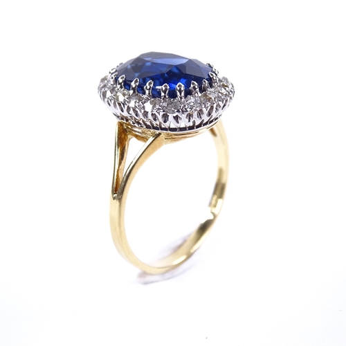 1123 - An oval sapphire and diamond cluster ring, circa 1915, central oval mixed-cut sapphire approx 5.66ct... 