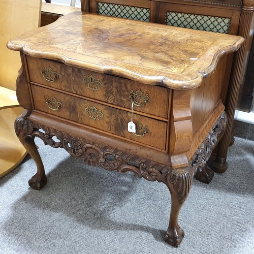 348 - A Continental crossbanded walnut chest of 2 drawers, with shaped top, carved apron and cabriole legs... 