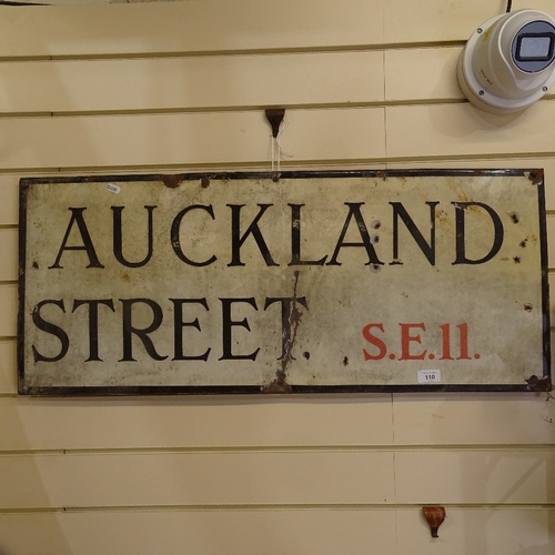 110 - A Vintage London Auckland Street SE11 black white and red enamel street sign, 38cm x 90cm