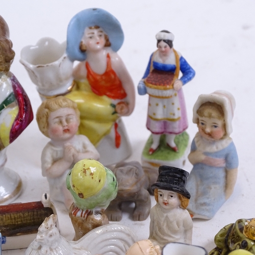 181 - A group of miniature ceramic and porcelain figurines (boxful)