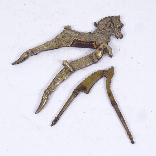 186 - 2 19th century Middle Eastern brass nutcrackers, 1 formed as a prancing horse, length 17cm (2)