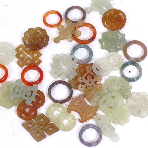 198 - A group of Chinese jade amulets, pendants and rings (boxful)