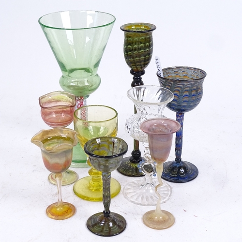 201 - A group of early 20th century Venetian handblown latticino drinking glasses, including uranium glass... 