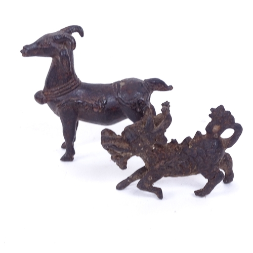 214 - A group of Eastern cast metal figures and animals, largest height 10cm (7)