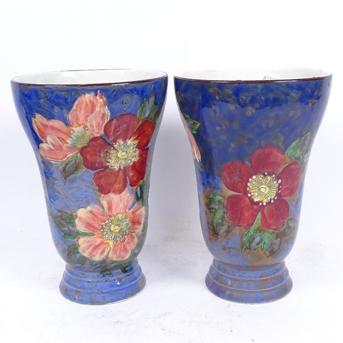 232 - A pair of Royal Doulton Wild Rose vases, shape no. 8125, pattern no. D6227, height 22cm