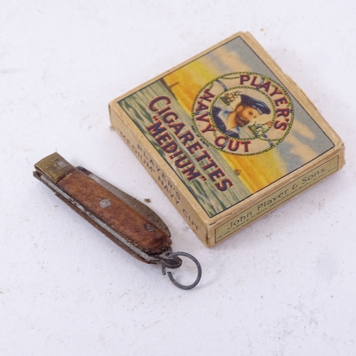 235 - Miniature Player's Navy Cut cigarettes packet, miniature penknives, Scottish hardstone pendant etc