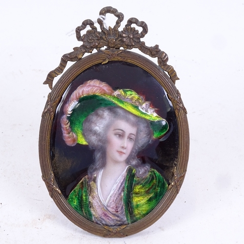 245 - A 19th century hand painted watercolour and enamel miniature portrait, depicting a Gainsborough styl... 