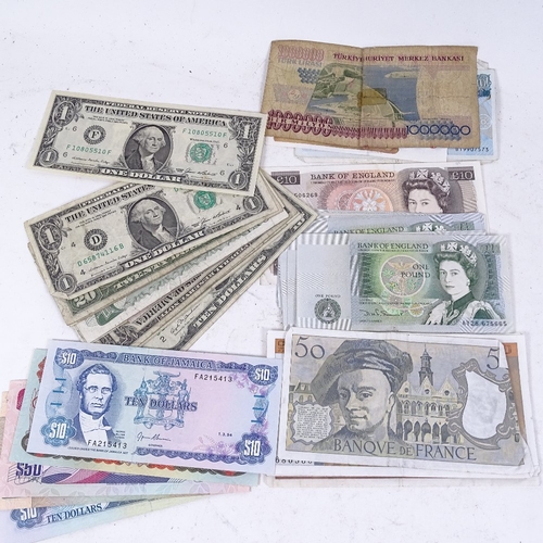 253 - Various world banknotes, including British, American, Spanish, French and Jamaican