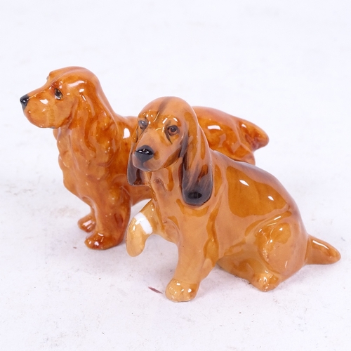 266 - A Royal Worcester Cocker Spaniel dog, model no. 2944, and a Royal Doulton Spaniel, height 6cm (2)