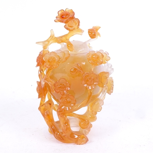 276 - A Chinese carved and polished agate peach pot and cover, height 11cm