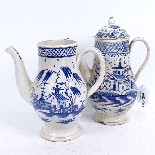 294 - A pair of English blue and white ceramic teapots, chinoiserie decoration, largest height 25cm, both ... 