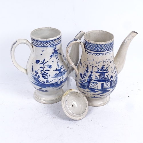 294 - A pair of English blue and white ceramic teapots, chinoiserie decoration, largest height 25cm, both ... 