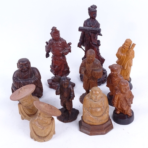 296 - A group of Oriental carved hardwood figures, largest height 18cm (11)