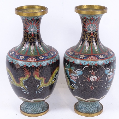 73 - A pair of Chinese black cloisonne enamel brass vases, dragon decoration, height 26cm