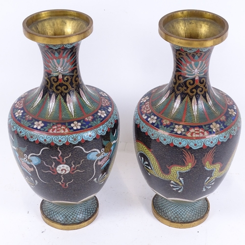 73 - A pair of Chinese black cloisonne enamel brass vases, dragon decoration, height 26cm