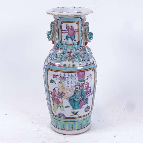 84 - A Chinese famille verte baluster vase, figure decoration with dragon mounts, height 25cm