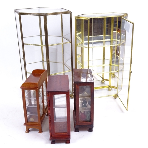 93 - A group of small table-top display cabinets, largest height 27cm (5)