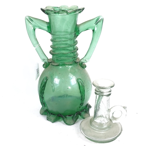 301 - A 19th century green glass vase with applied decoration, 28.5cm, and an Antique glass candlestick