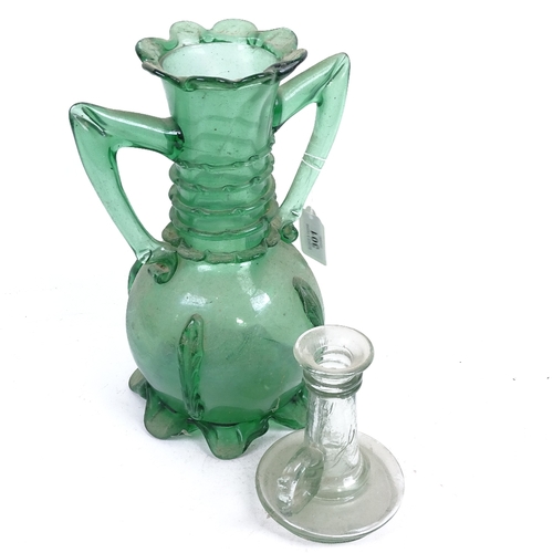 301 - A 19th century green glass vase with applied decoration, 28.5cm, and an Antique glass candlestick