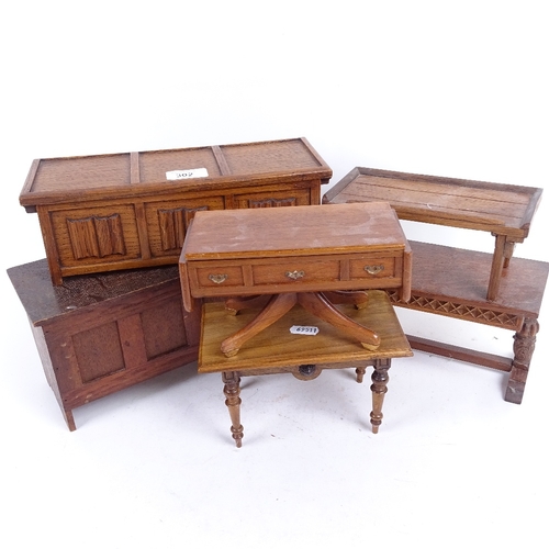 302 - 2 miniature panelled oak coffers, longest 29cm, a carved oak table with rising top, possibly and app... 