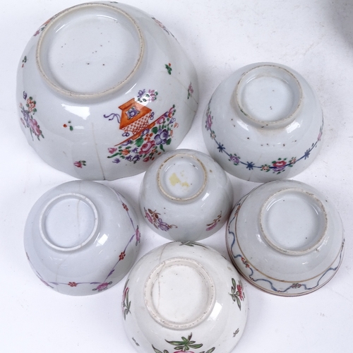 306 - Chinese tea bowls with painted floral designs, saucers and larger bowls