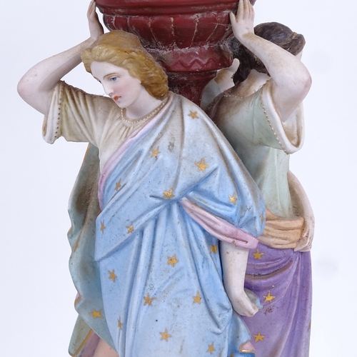 313 - A 19th century porcelain stand supported by painted figures of The Three Graces, 30cm