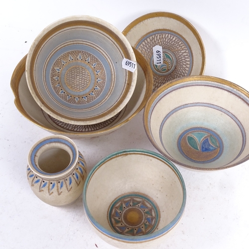 318 - Emmie Philps (born 1918), 6 pieces of Studio pottery, including bowls and a small vase, hand painted... 