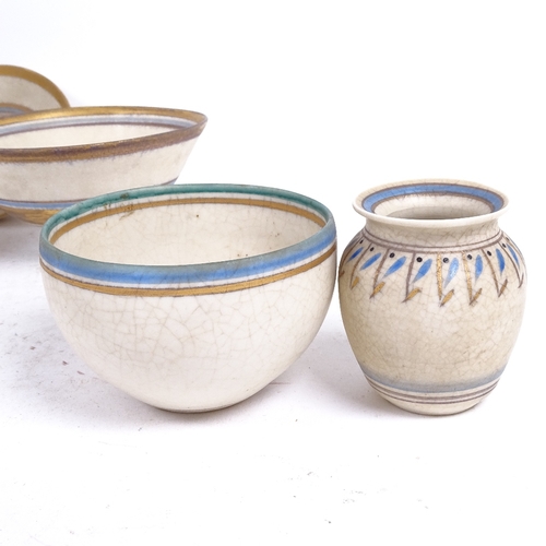 318 - Emmie Philps (born 1918), 6 pieces of Studio pottery, including bowls and a small vase, hand painted... 