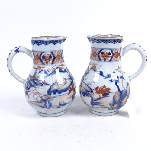 325 - A pair of Imari porcelain jugs with painted and gilded decoration (A/F), height 20.5cm