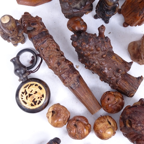 336 - Various treen items, including a carved rootwood Oriental figure, 11.5cm, a snuff bottle, gilded fig... 