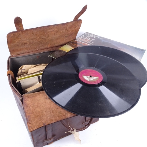 353 - A metal-lined leather bag containing a quantity of 78rpm records, various genre