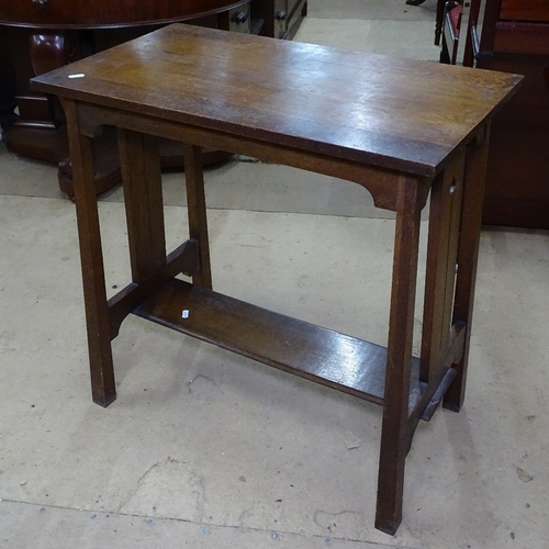 1758 - A stylised Arts and Crafts oak hall table, with pierced sides, on square tapered legs, W72cm, H73cm,... 