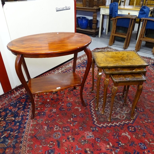 2034 - A walnut nest of 3 occasional tables, and an oval mahogany 2-tier occasional table