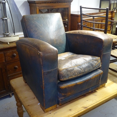 2038 - An early 20th century leather upholstered Club chair