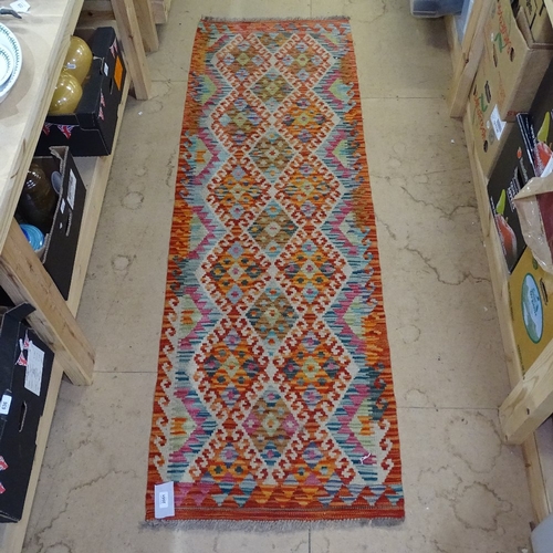 2051 - A Choli Kilim runner, 199cm x 64cm