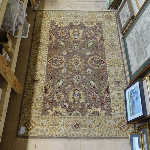 2052 - A Gazni beige ground rug, 182cm x 104cm