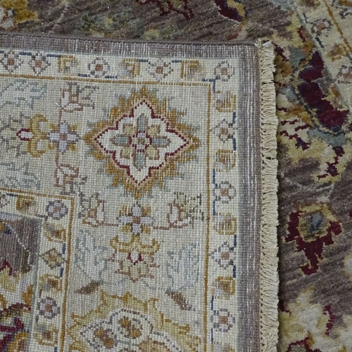 2052 - A Gazni beige ground rug, 182cm x 104cm